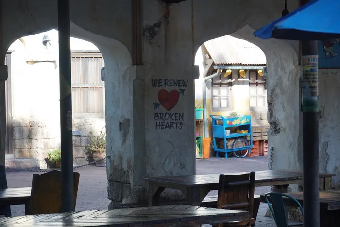 Wall art saying 'we renew broken hearts'