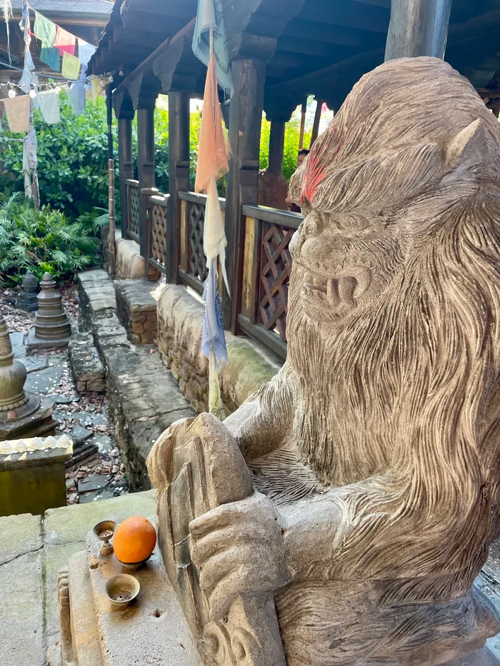 A statue of a yeti outside the Expedition Everest ride in the Asia themed land.