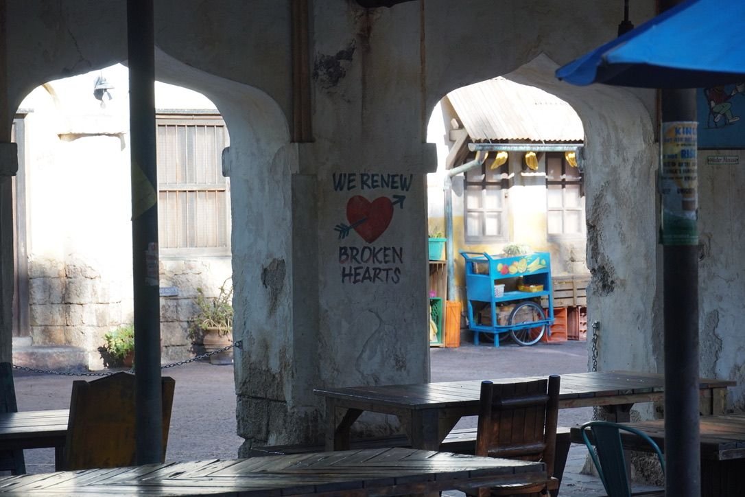 Wall art saying "we renew broken hearts"